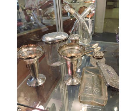 A collection of early 20th Century and later small silver to include toilet jars, enamel coffee spoons, stem vases etc