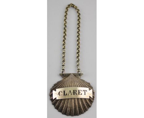A George III silver scallop shell claret decanter label, Benjamin Smith, 1807, H. 5cms