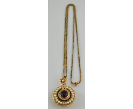 A Regency yellow gold memorial brooch, the central faceted amathyst within a black enamel band and seed pearl boarder, engrav