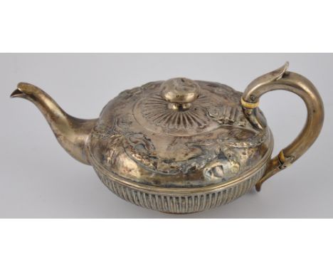 A Victorian silver Bachelor teapot, compressed circular form, part fluted and chased with robbons and husk swags, scroll hand