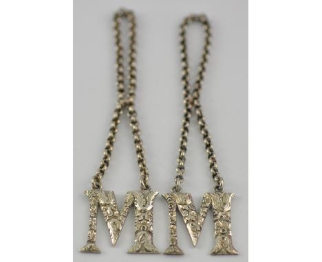 A pair of George III cast Irish silver decanter labels, Henry Flavelle, Dublin 1827