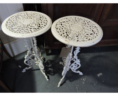 A pair of Victorian style pierced cast metal tripod plant stand, h:60cm
