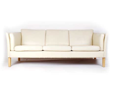 A London-style cream leather three seater sofa on square beech feet, l. 195 cm