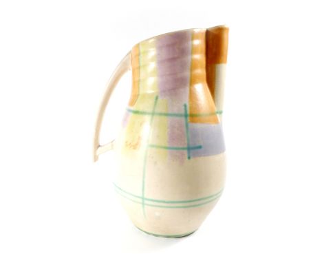 An early 20th century Beswick lemonade jug of Art Deco design decorated in pastel shades, h. 27.5 cm CONDITION REPORT: Crackl