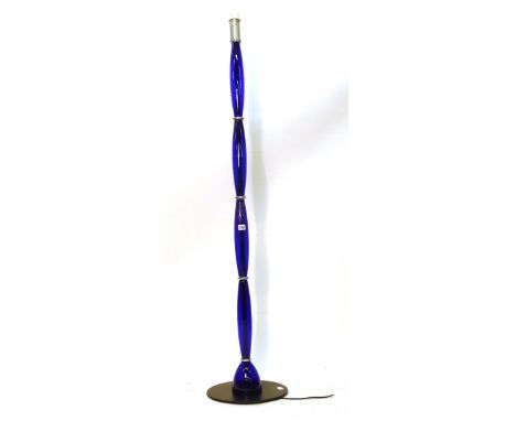 A Murano glass standard lamp of undulating form of a circular base CONDITION REPORT: Lead cut, working order unknown
