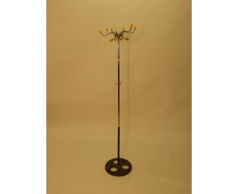 A black rod five branch wall mounted coat hook having five multicoloured spherical holders in the manner of Eames, w. 50 cm C