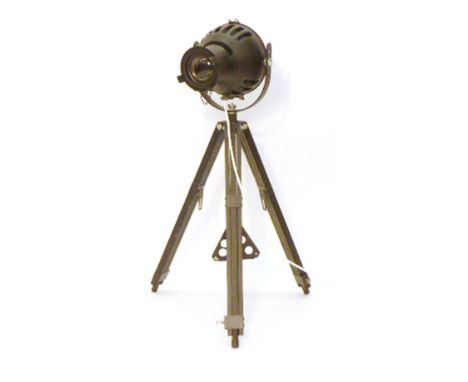 A Furse black metal theatre spotlight on a matching tripod base CONDITION REPORT: Re-wired, working order not guaranteed