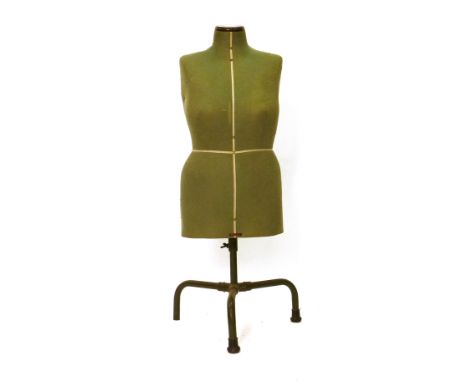 A 1950's Singer dressmaker's mannequin on a tubular tripod base, with badge