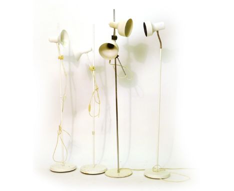 A group of four 1970's white enamelled standard lamps including one twin spot lamp CONDITION REPORT: Working order unknown, k