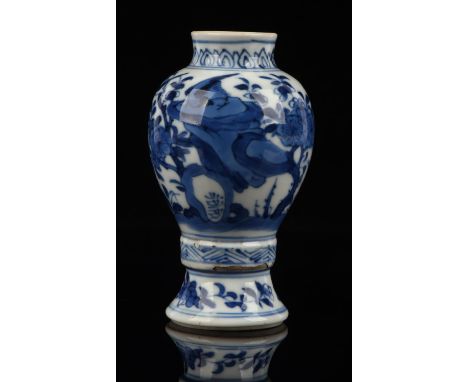 A small blue and white vase decorated with birds and flowers, about 9.5 cm high, Kangxi. Provenance: The Property of a Lady. 