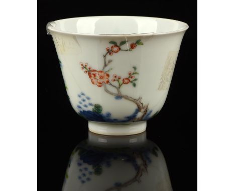 Kangxi Style: An underglaze blue and enamel, 'Lunar Month style', wine cup decorated with a Crabtree, or other floral design 