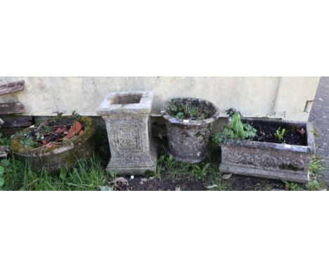 Three reconstituted stone garden items, to comprise a trough 20cm high x 45cm wide x 27cm deep, a plinth, 41cm high and a bas