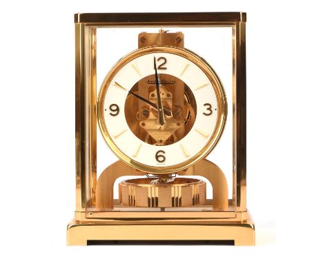 A Swiss gilt-brass 'Atmos' clock by Jaeger Lecoultre, Geneva, late 20th Century, the circular dial with applied gilt chapters