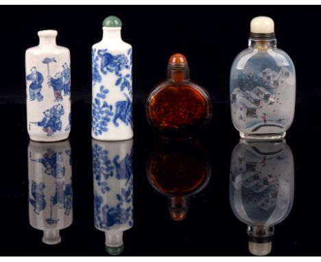 Four Chinese snuff bottles, comprising: two in blue and white [one marked with Tongzhi mark; the other marked with Qianlong m