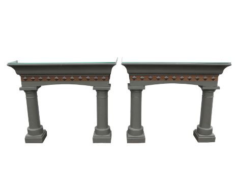 A pair of green painted oak console tables, in the George II style, modern, with removable speckled mirror glass tops, H 91cm