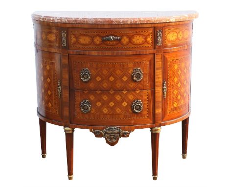 A Louis XVI style kingwood commode, late 20th century, with a mottled pink marble top, of demi lune form and with parquetry a