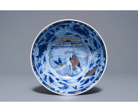 A rare Chinese blue and underglaze red bowl with carps and marine animals, Xuande mark, Kangxi     Dia.: 19 cm - H.: 9 cmSee 