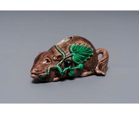A Chinese aubergine-glazed water dropper modelled as a squirrel, Kangxi     Dim.: 8,5 x 4 x 4 cmProvenance: The collection of