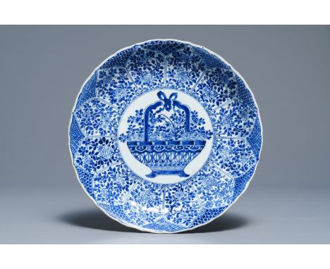 A Chinese blue and white 'flower basket' charger, Kangxi     Dia.: 35 cm         Condition reports and high resolution pictur