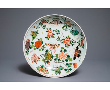 A Chinese famille verte dish with butterflies among blossoms, Kangxi     Dia.: 35 cm         Condition reports and high resol