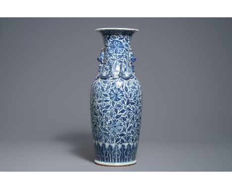 A Chinese blue and white 'lotus scroll' vase, 19th C.     H.: 64 cm           Condition reports and high resolution pictures 