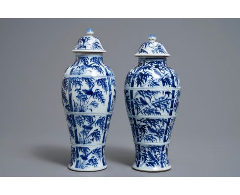 A pair of Chinese blue and white vases and covers with birds on bamboo branches, Kangxi     H.: 27 cm         Condition repor