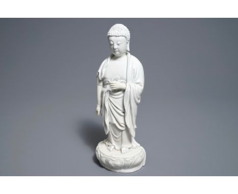 A Chinese Dehua blanc de Chine model of a standing Buddha, impressed mark on the back, Kangxi     H.: 33,5 cm  Condition: (UV