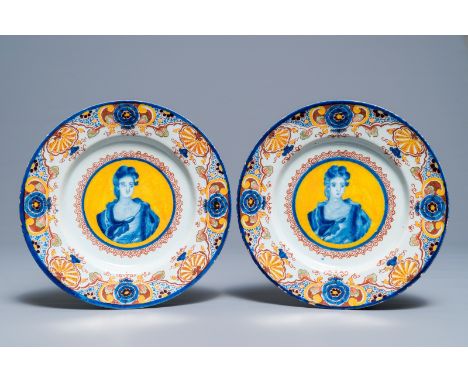 A pair of polychrome Dutch Delft yellow-ground portrait plates, 18th C.     Dia.: 22,5 cm         Condition reports and high 