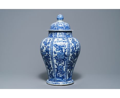 A large Chinese blue and white baluster jar and cover with floral panels, Kangxi     H.: 62 cm         Condition reports and 