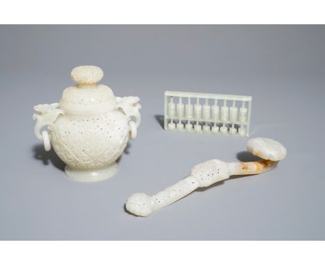 A Chinese reticulated jade incense burner, a ruyi scepter and an abacus, 19/20th C.     L.: 25 cm (the scepter) H.: 14,5 cm (
