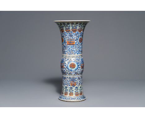 A clobbered Chinese blue and white 'gu' beaker vase, Kangxi     H.: 50 cm         Condition reports and high resolution pictu