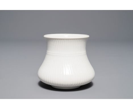 A Chinese blanc de Chine brush pot, Kangxi     H.: 7 cm  Provenance: The collection of a Belgian industrialist family, formed