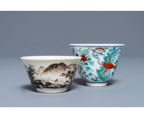 Two Chinese grisaille and doucai wine cups, Yongzheng marks, 19/20th C.     Dia.: 6,5 cm - H.: 5 cm (the grisaille cup)Dia.: 