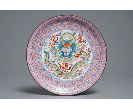 A Chinese Canton enamel 'dragon' dish, 19th C.     Dia.: 33,5 cm         Condition reports and high resolution pictures are a