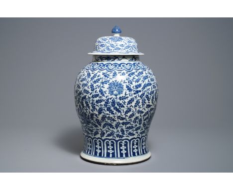 A Chinese blue and white 'lotus scroll' vase and cover, 19th C.     H.: 59,5 cm         Condition reports and high resolution