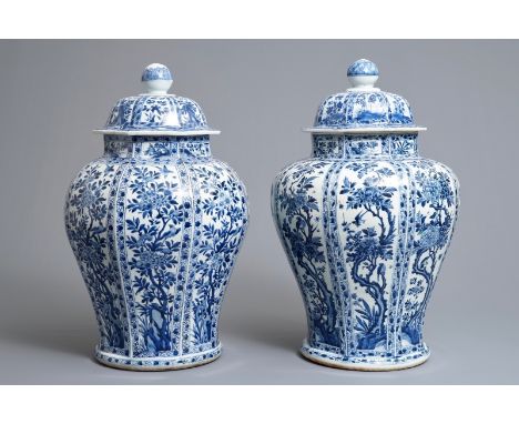 A pair of large Chinese blue and white octagonal baluster vases and covers, Kangxi     H.: 59 cm         Condition reports an