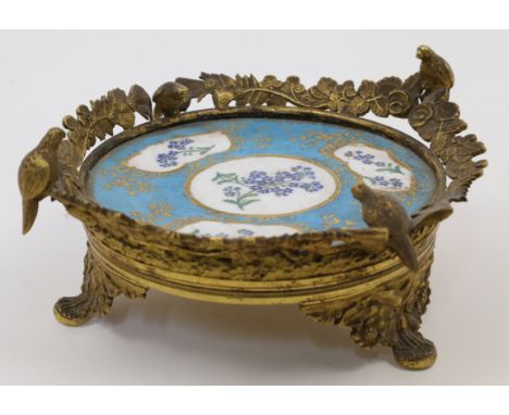 A gilt-bronze mounted Sevres-style porcelain tazza, 19th century, the mount with four birds perched facing inward as if towar