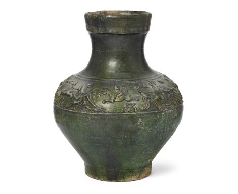 A Chinese lead green-glazed moulded vase, Han dynasty, moulded around the shoulder with a border of a hunting scene with arch