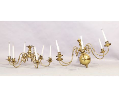 A pair of large Dutch brass twelve-light chandelier, early 20th century, the ball knopped stem supporting scrolled branches, 