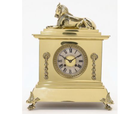 A French brass Egyptian Revival mantel clock, by Achille Brocot of Paris, 19th century, the case of architectural form surmou