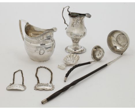 A small group of Georgian silver, comprising: a George III caddie spoon, 1797, Peter & Ann Bateman, engraved with floral moti