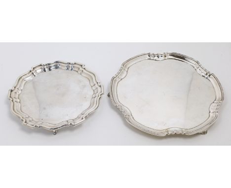 A silver waiter, Sheffield, 1929, Mappin &amp; Webb, of circular form, with shaped border, on three pad feet, 20.8cm diameter