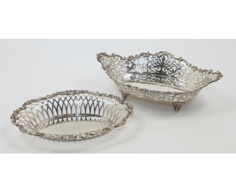 Two silver baskets, comprising: a Victorian example, London, 1899, William Hutton &amp; Sons Ltd., of pierced oval form with 