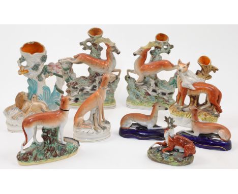 A group of eight Staffordshire ceramic flatback figures, vases and ornaments, 18th - 19th centuries, to include: a pair of sp