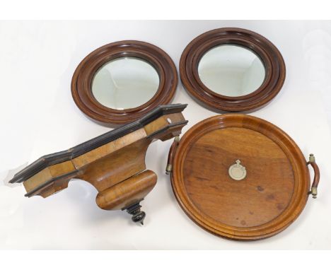 A pair of Edwardian mahogany convex wall mirrors, each with boxwood and ebony inlay to the borders, the mirror plates approx.
