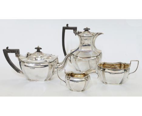 A three-piece silver tea set, comprising: a teapot, a cream jug and a twin handled sugar bowl, Sheffield, 1917, R F Mosley &a