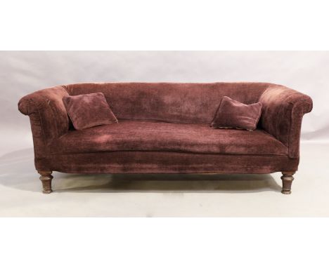 A Victorian mahogany framed chesterfield sofa, last quarter 19th century, purple fabric upholstery, on turned front legs, sta