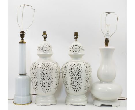 A group of four modern lamp bases, 20th century, to include a ceramic pair designed as creamware baluster vases with openwork