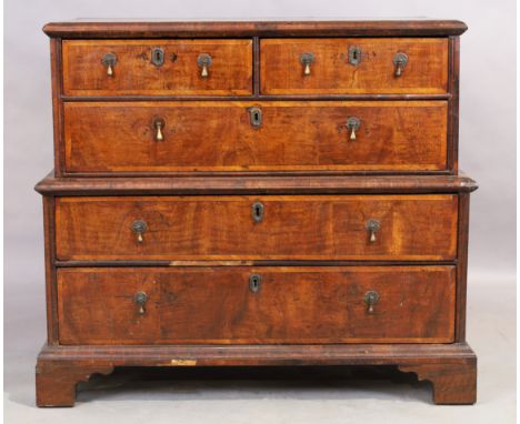 An English walnut chest on chest, 18th century, two short and three long drawers, on bracket feet, 89cm high, 101cm wide, 55c