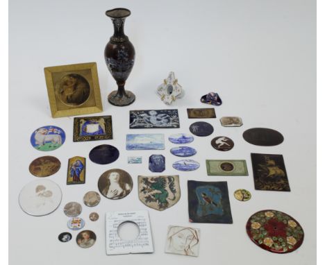 A collection of enamel plaques and collectibles, 18th century and later, to include an enamel baluster vase with Renaissance 